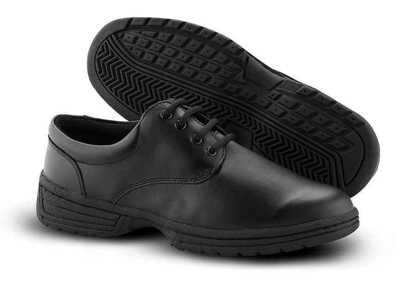 MTX marching shoes in black and white, showcasing reinforced toe box, moisture-wicking lining, and rugged X‑TremeTrak sole for optimal grip on wet or dry surfaces.