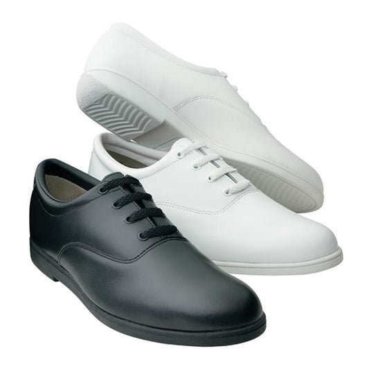 Dinkles Vanguard marching band shoe in black (or white) polished upper, lace-up oxford construction, padded collar, and low-profile rubber heel designed for field and parade featuring non-marking rubber outsole with pivot disc and shallow flex grooves for secure movement on turf and gym floors